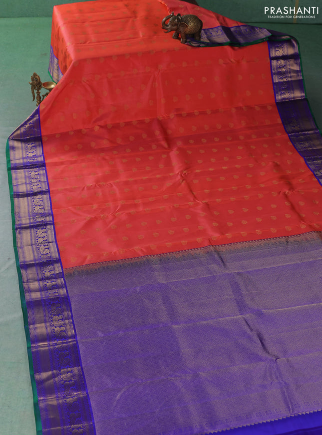 Pure kanchipuram silk saree peach orange and violet with allover zari woven buttas and zari woven korvai border