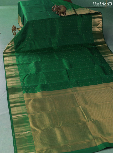 Pure kanchipuram silk saree green with allover zari woven 1000 buttas and temple zari woven border
