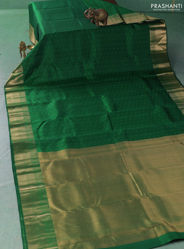 Pure kanchipuram silk saree green with allover zari woven 1000 buttas and temple zari woven border