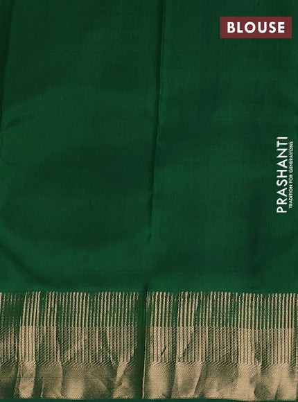 Pure kanchipuram silk saree green with allover zari woven 1000 buttas and temple zari woven border