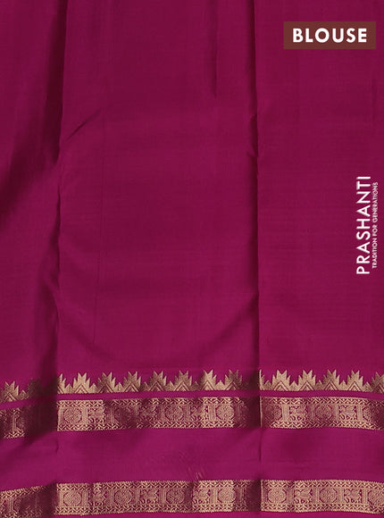 Pure kanchipuram silk saree blue shade and magenta pink with allover checked pattern and rettapet zari woven border