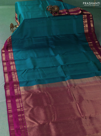 Pure kanchipuram silk saree teal green and magenta pink with allover checked pattern and rettapet zari woven border