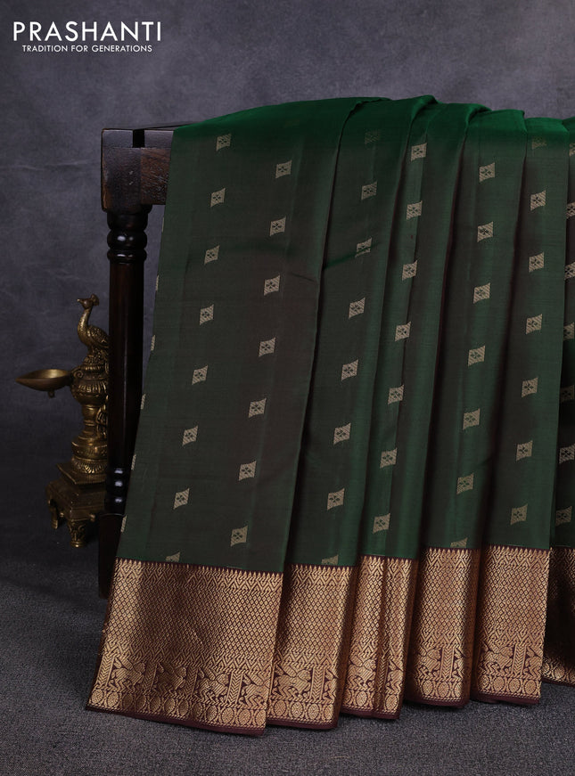 Pure kanchipuram silk saree bottle green and coffee brown with allover zari woven buttas and zari woven border