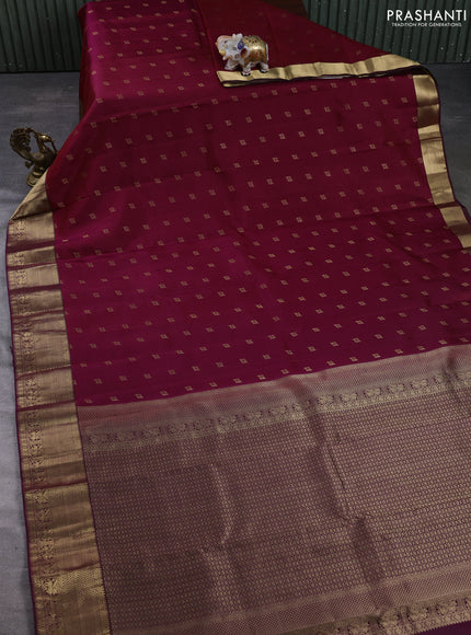 Pure kanchipuram silk saree dual shade of magenta and deep purple with allover zari woven buttas and zari woven border