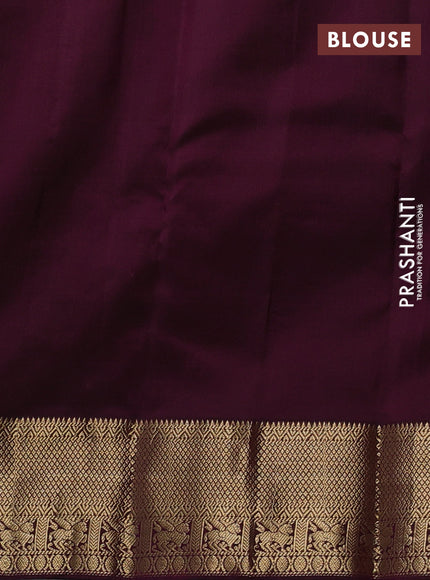 Pure kanchipuram silk saree dual shade of magenta and deep purple with allover zari woven buttas and zari woven border