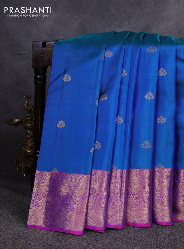 Pure kanchipuram silk saree dual shade of bluish green and pink with zari woven buttas and zari woven korvai border
