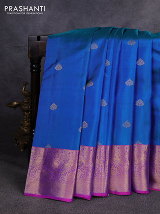 Pure kanchipuram silk saree dual shade of bluish green and pink with zari woven buttas and zari woven korvai border