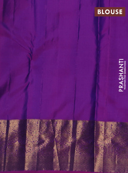Pure kanchipuram silk saree dual shade of bluish green and pink with zari woven buttas and zari woven korvai border