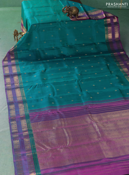 Pure kanchipuram silk saree teal green and pink with zari woven buttas and rettapet zari woven border