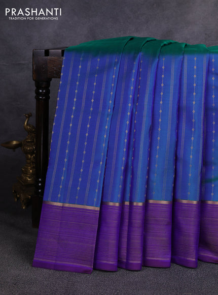 Pure kanchipuram silk saree dual shade of bluish green and violet with allover zari weaves & buttas and zari woven border