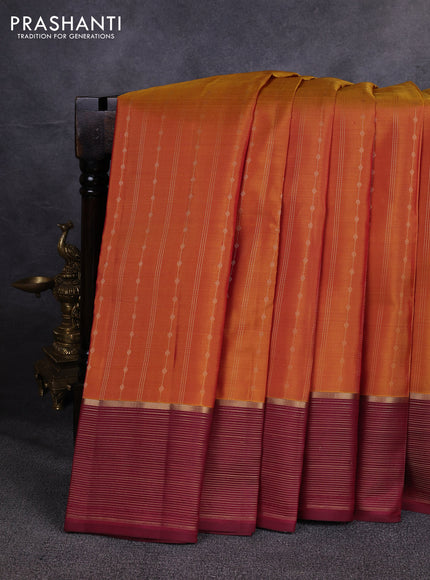 Pure kanchipuram silk saree dark mustard and maroon with allover zari weaves & buttas and zari woven border