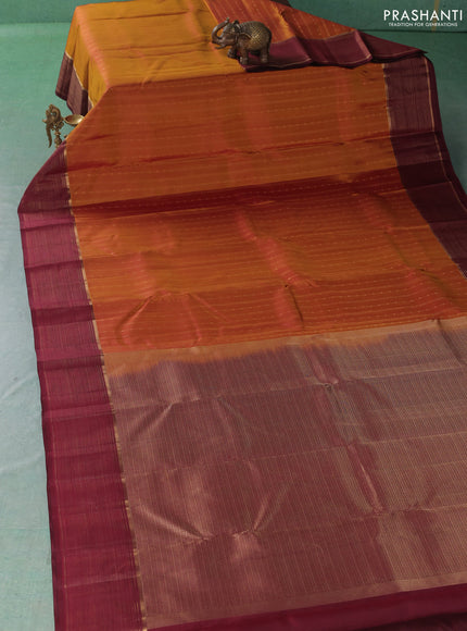 Pure kanchipuram silk saree dark mustard and maroon with allover zari weaves & buttas and zari woven border