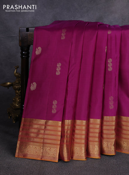 Pure kanchipuram silk saree magenta pink and mustard yellow with zari woven buttas and zari woven border