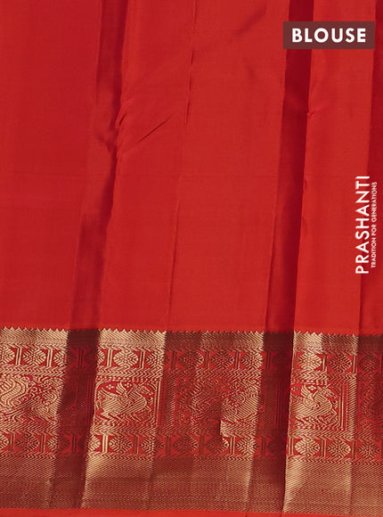 Pure kanchipuram silk saree beige and orange with allover zari woven buttas and long zari woven korvai border