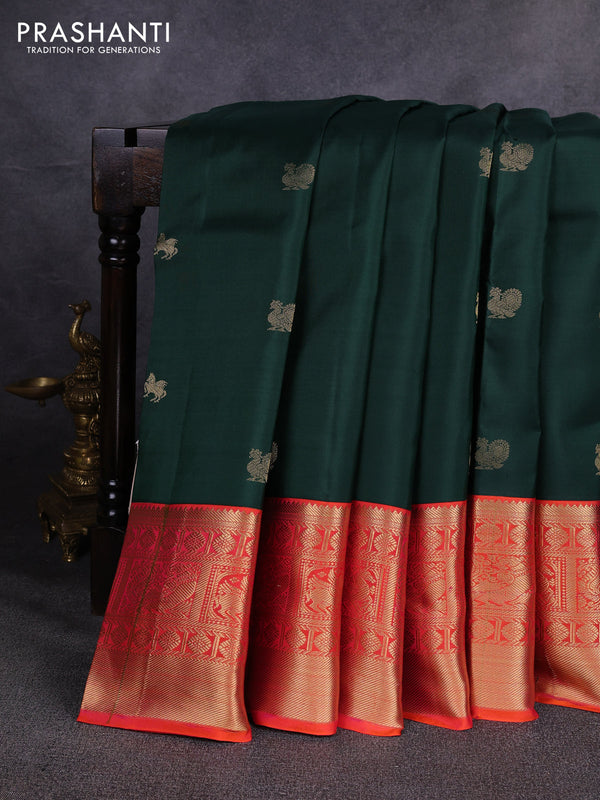 Pure kanchipuram silk saree bottle green and orange with allover zari woven buttas and long zari woven korvai border
