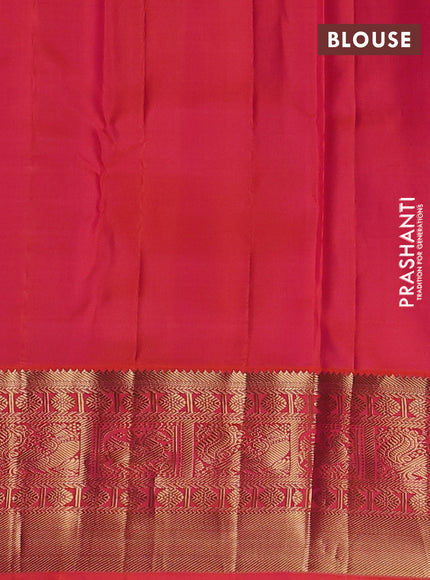 Pure kanchipuram silk saree bottle green and orange with allover zari woven buttas and long zari woven korvai border