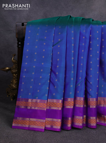 Pure kanchipuram silk saree dual shade of bluish green and purple with allover zari woven 1000 buttas and rettapet thread & zari woven border