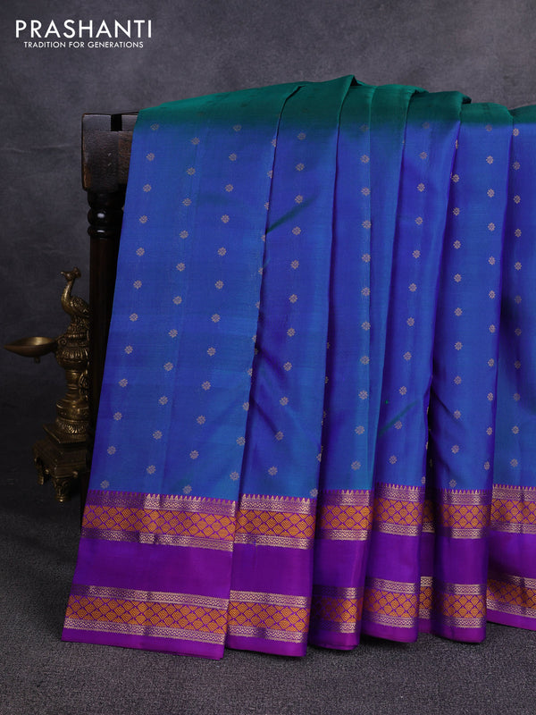 Pure kanchipuram silk saree dual shade of bluish green and purple with allover zari woven 1000 buttas and rettapet thread & zari woven border