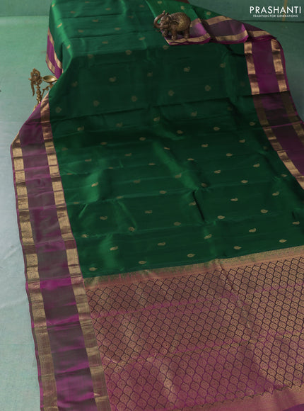 Pure kanchipuram silk saree green and purple with allover zari woven buttas and rettapet zari woven border