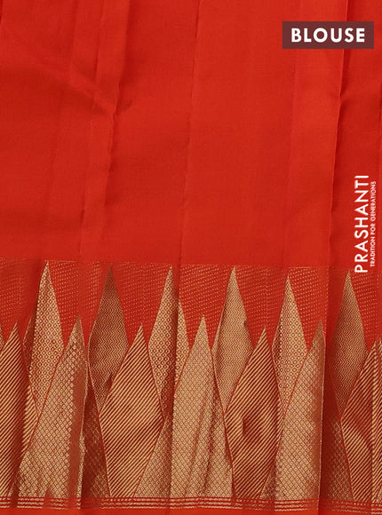 Pure kanchipuram silk saree orange with allover zari woven buttas and temple design zari woven border