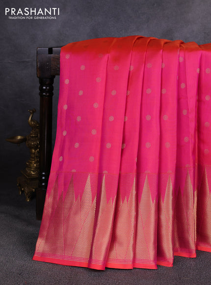 Pure kanchipuram silk saree dual shade of pinkish orange with allover zari woven buttas and temple design zari woven border