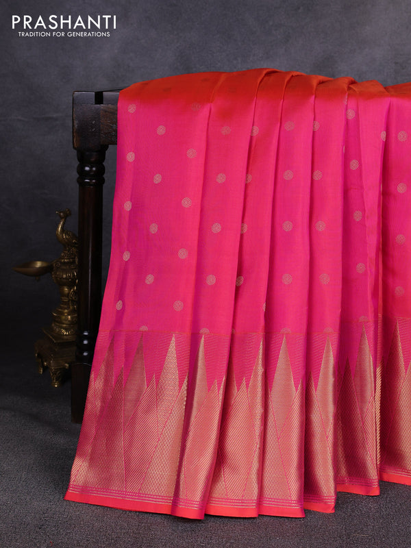 Pure kanchipuram silk saree dual shade of pinkish orange with allover zari woven buttas and temple design zari woven border
