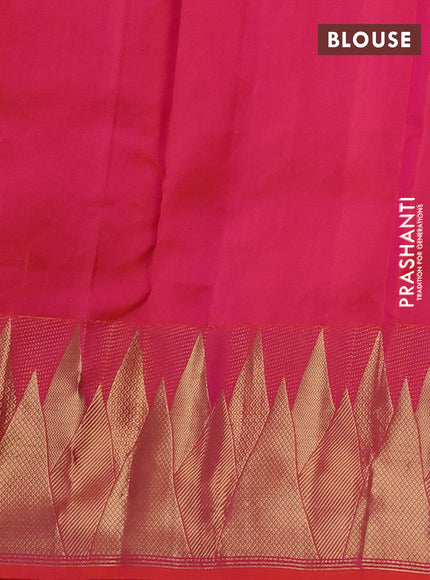 Pure kanchipuram silk saree dual shade of pinkish orange with allover zari woven buttas and temple design zari woven border