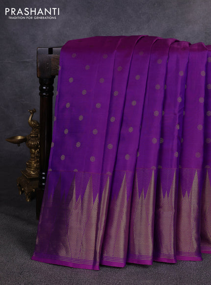 Pure kanchipuram silk saree purple with allover zari woven buttas and temple design zari woven border