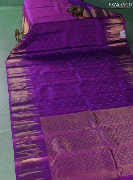 Pure kanchipuram silk saree purple with allover zari woven buttas and temple design zari woven border