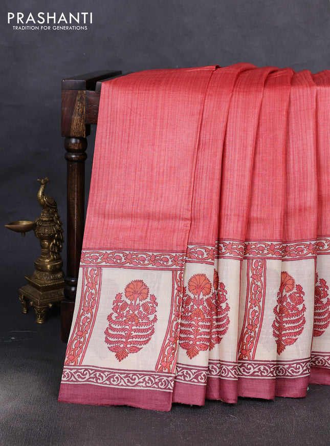 Pure tussar silk saree peach shade and cream  with plain body and blocked printed border