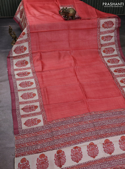 Pure tussar silk saree peach shade and cream  with plain body and blocked printed border