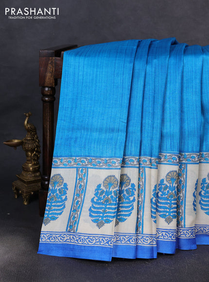 Pure tussar silk saree cs blue off white and blue with plain body and blocked printed border