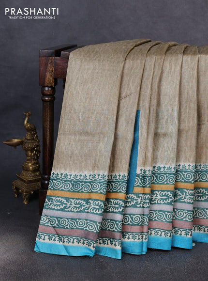 Pure tussar silk saree elaichi green and cs blue with plain body and blocked printed border