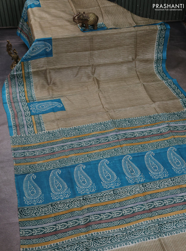 Pure tussar silk saree elaichi green and cs blue with plain body and blocked printed border