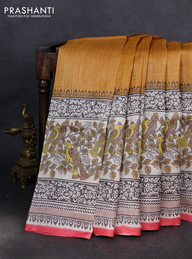 Pure tussar silk saree dark mustard and cream red with plain body and long blocked printed border