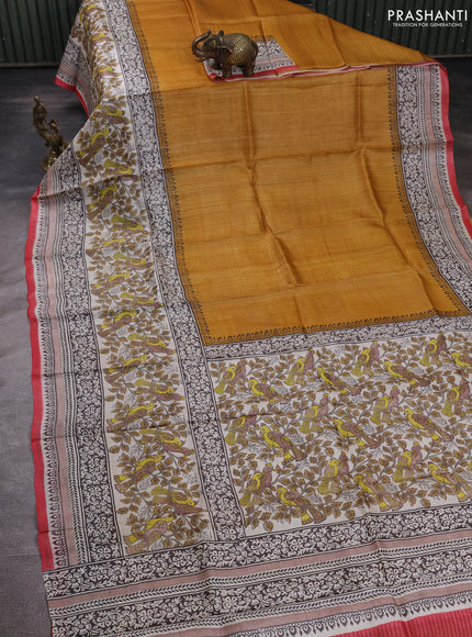 Pure tussar silk saree dark mustard and cream red with plain body and long blocked printed border