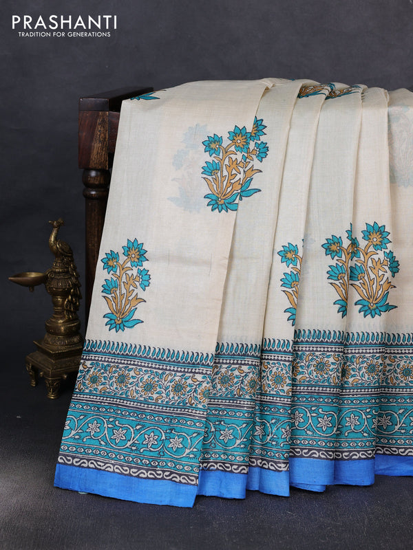 Pure tussar silk saree cream and cs blue with floral butta block prints and long blocked printed border