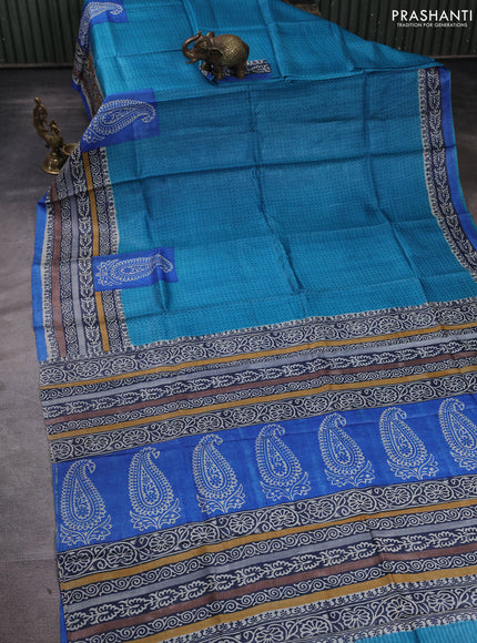 Pure tussar silk saree teal blue and blue with allover prints and blocked printed border