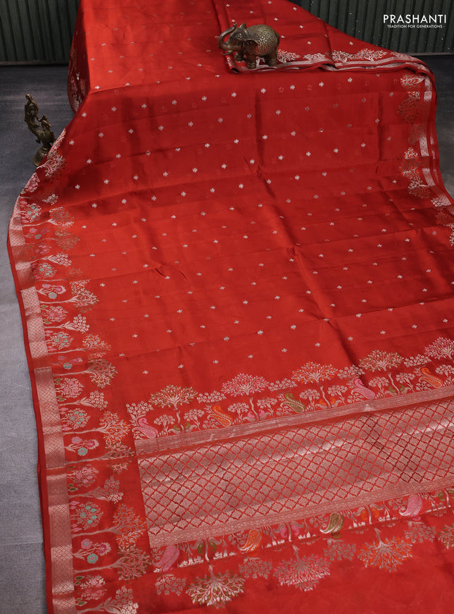 Banarasi poona silk saree rust shade with silver zari woven buttas and rich zari woven border