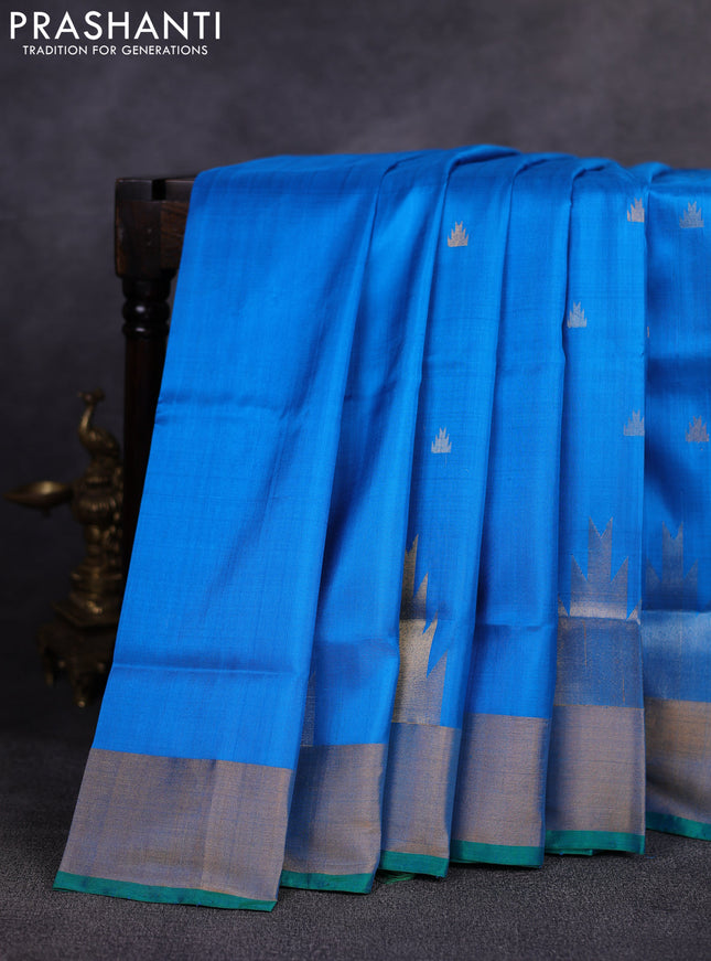 Pure uppada silk saree cs blue and green with allover silver & gold zari woven buttas and temple design zari woven border