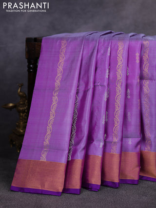 Pure uppada silk saree pastel purple and purple with allover silver & gold zari weaves & buttas and zari woven border