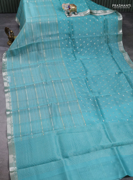 Banarasi organza saree teal blue with zari woven buttas and zari woven border