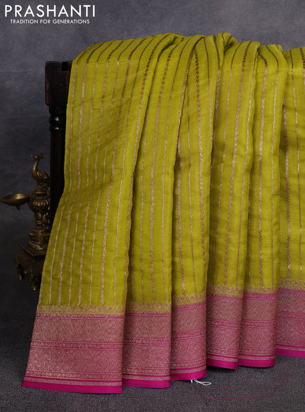 Banarasi organza saree lime green and pink with allover zari weaves and banarasi style border