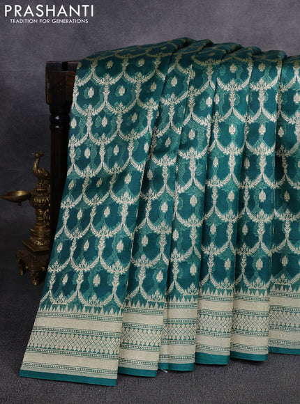 Banarasi organza saree teal green with allover zari weaves and banarasi style border