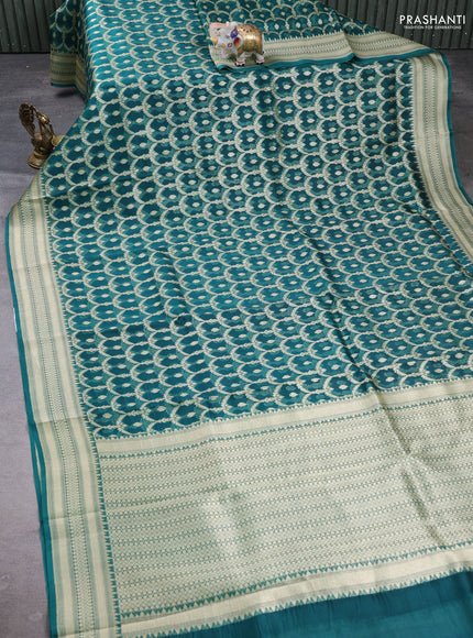 Banarasi organza saree teal green with allover zari weaves and banarasi style border