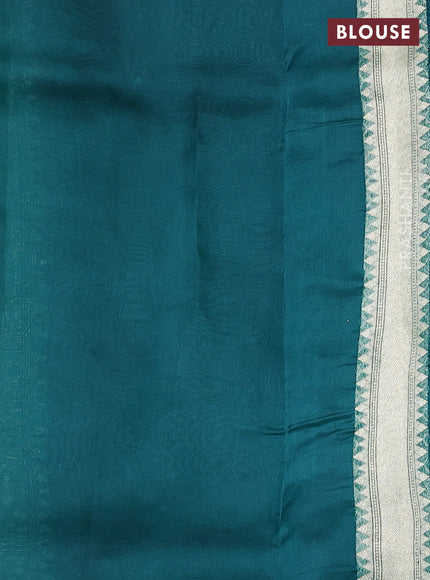 Banarasi organza saree teal green with allover zari weaves and banarasi style border