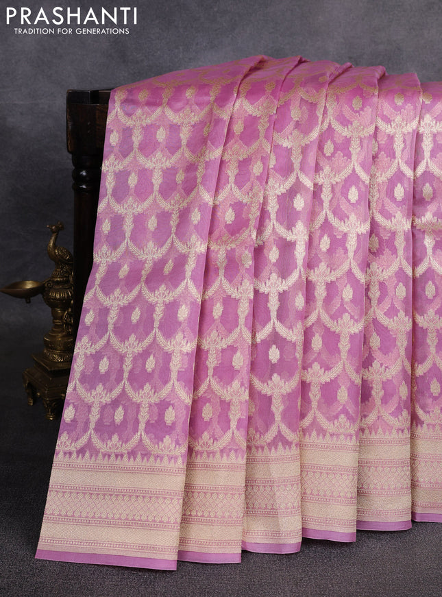 Banarasi organza saree light pink with allover banarasi weaves and zari woven border