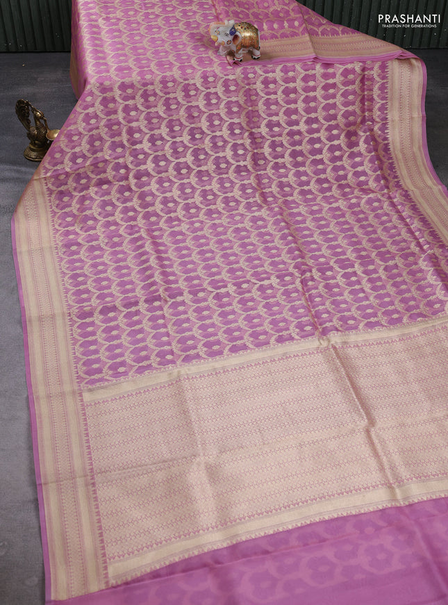 Banarasi organza saree light pink with allover banarasi weaves and zari woven border