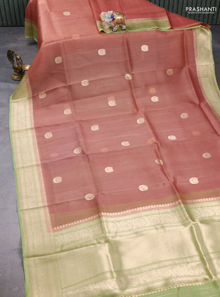 Banarasi organza saree peach shade and pista green with zari woven buttas and zari woven border