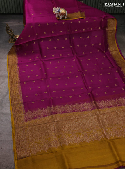Banarasi organza saree magenta pink and mustard yellow with woven buttas and banarasi style border